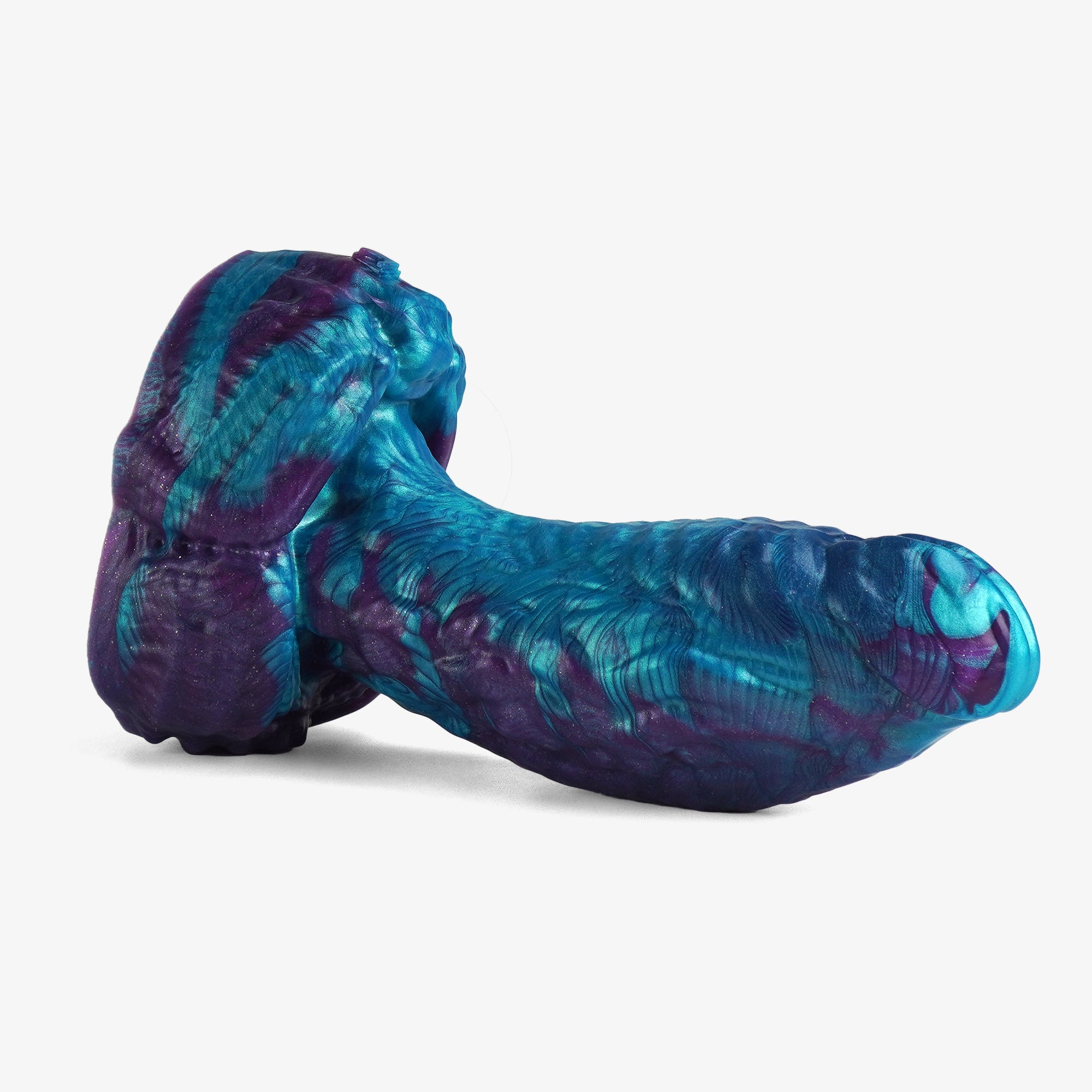 The alien dildo laying down.