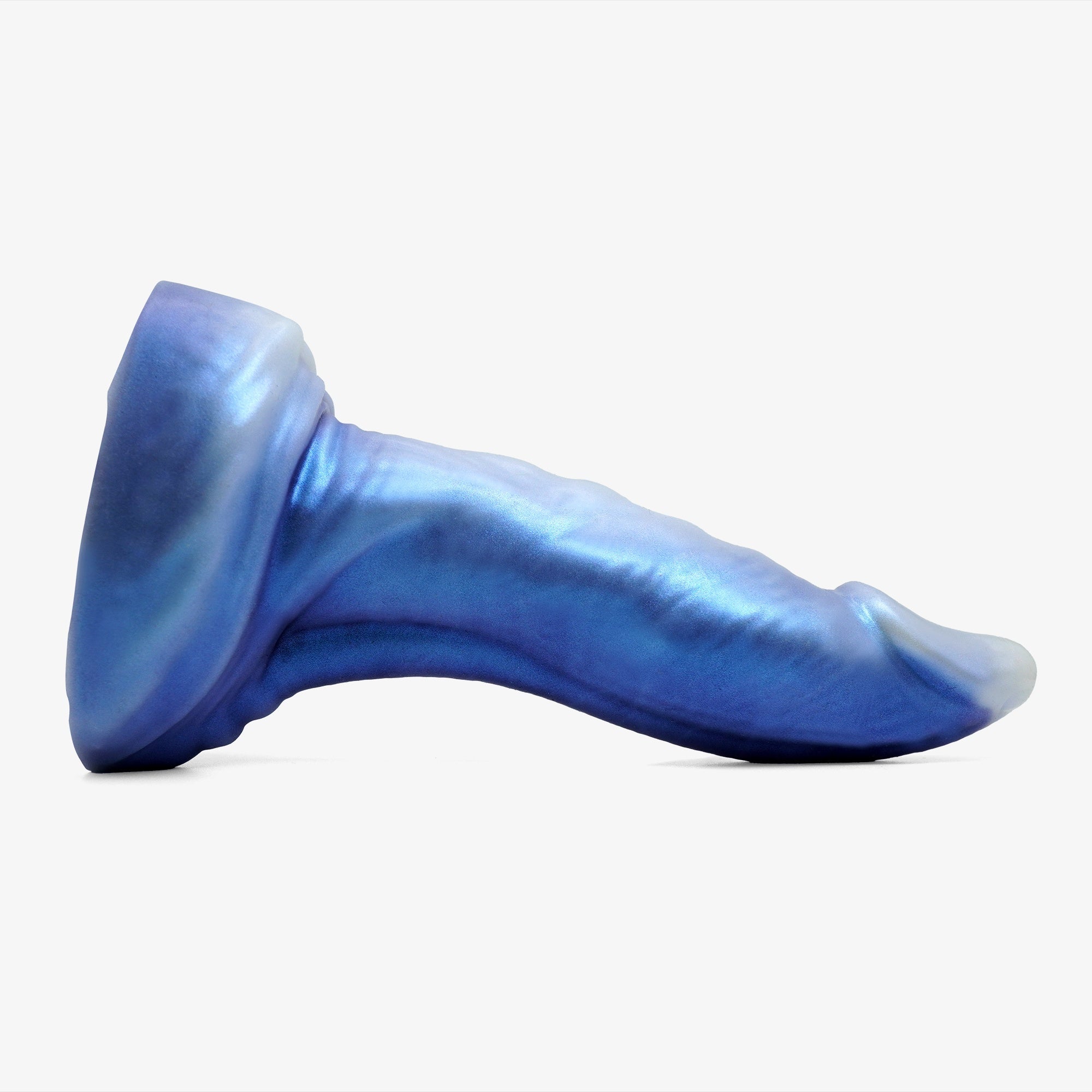 The dragon dildo laying down.