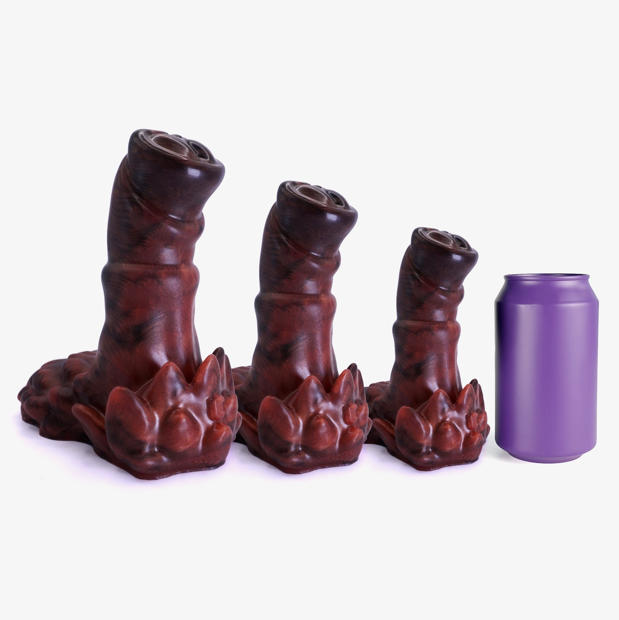 The owlbear dildo size comparison next to 330ml can.