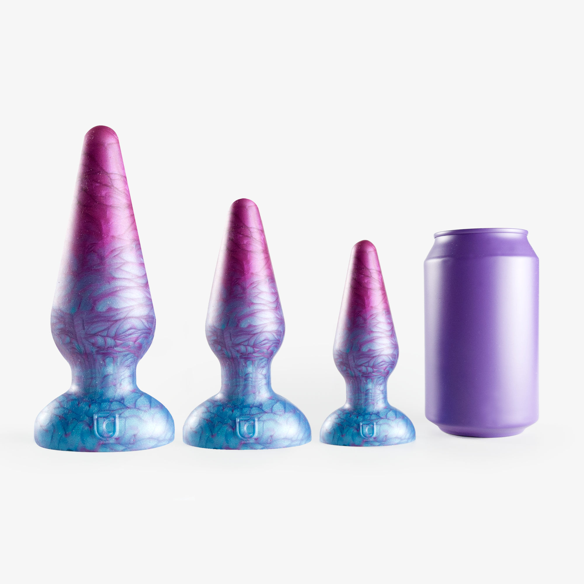 The plug butt plug size comparison next to 330ml can.