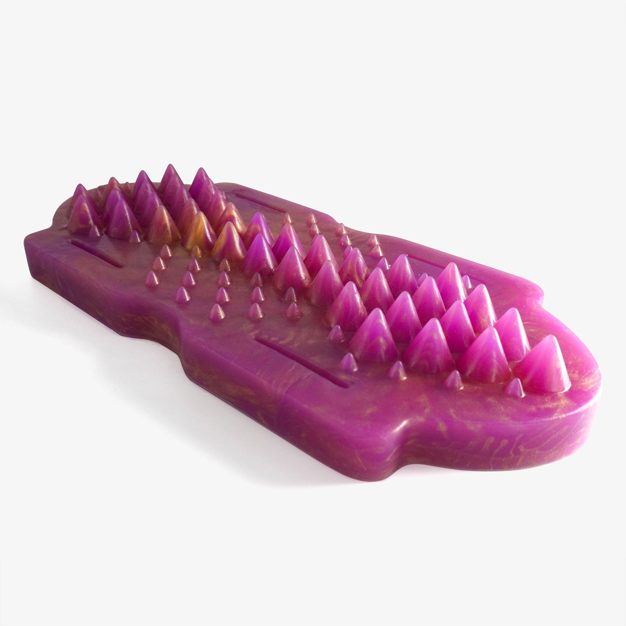 The spiked grinder laying down.