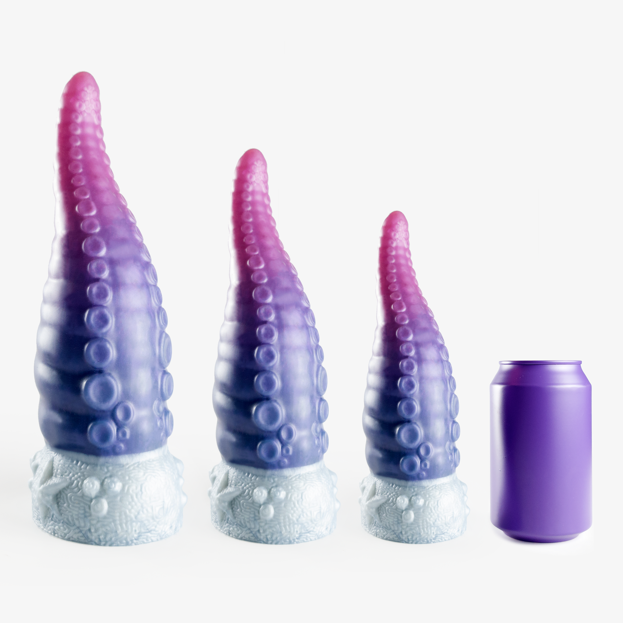 The tentacle dildo size comparison next to 330ml can.