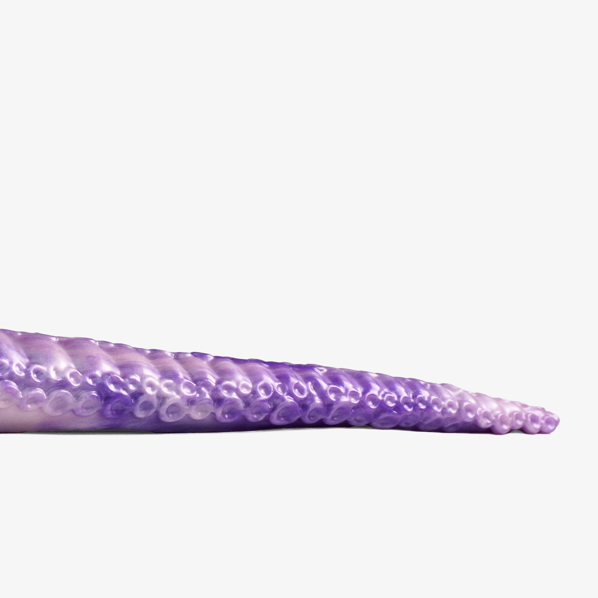 The tentacle depth trainer ii dildo laying down 3.