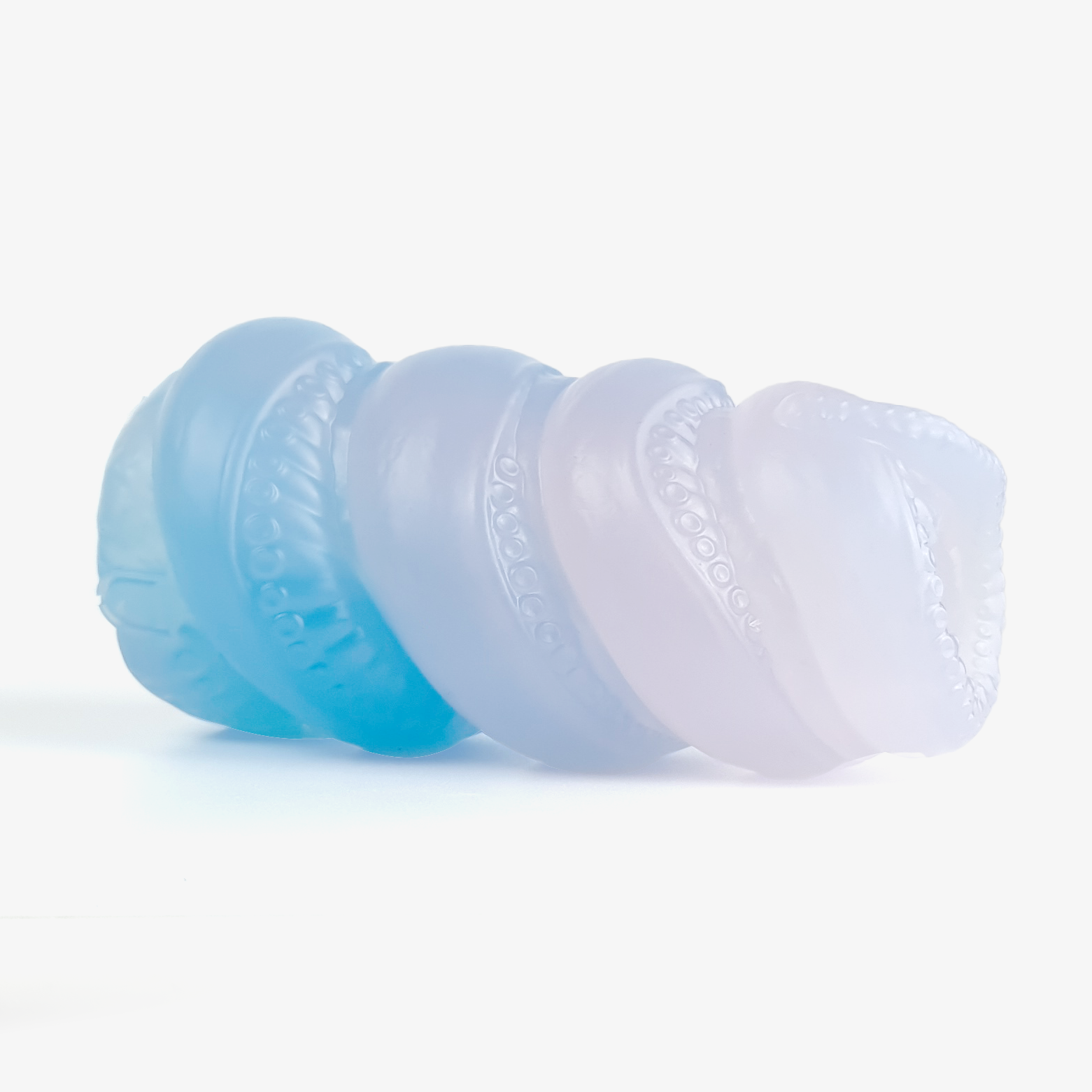 The tentacle masturbator laying down side on.