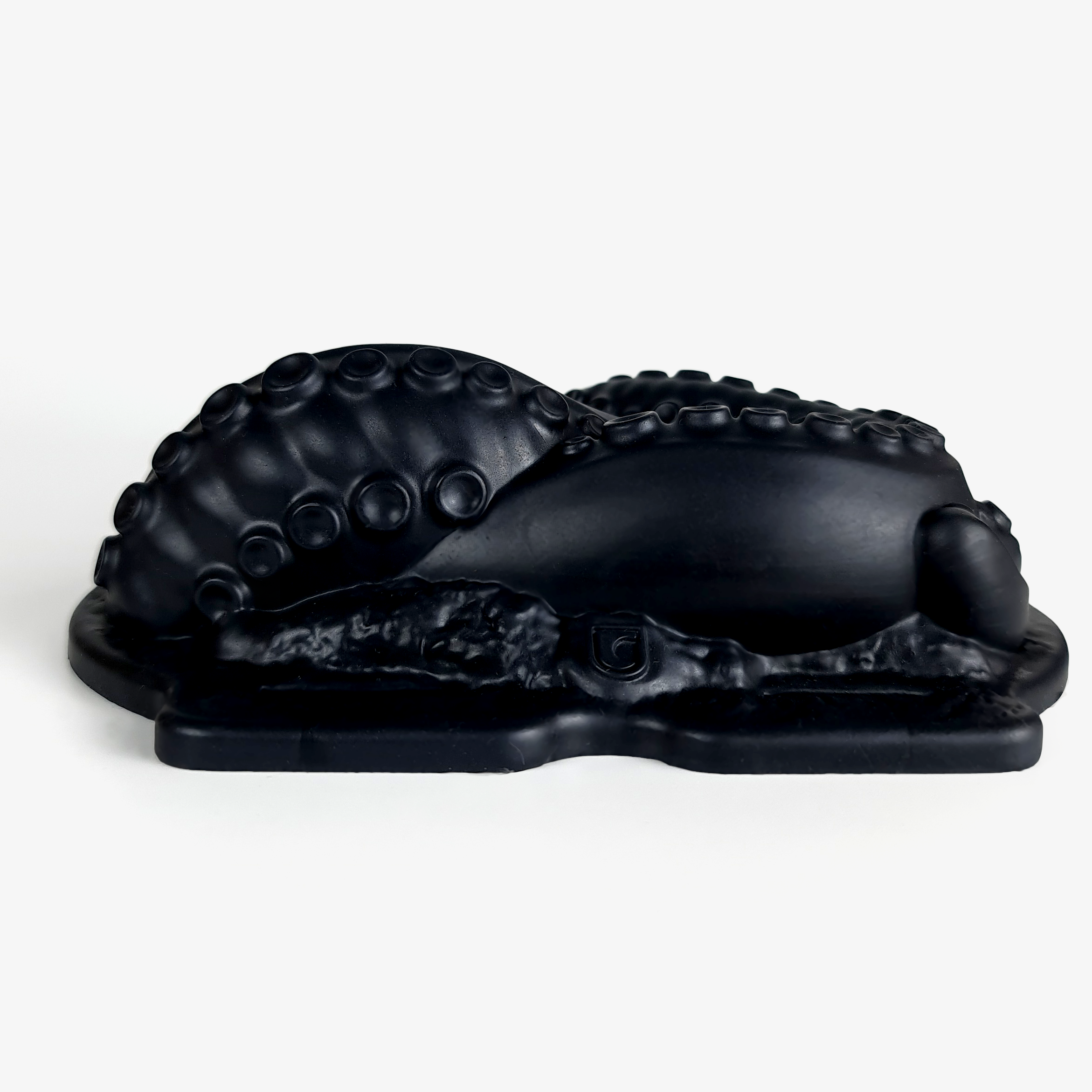 The tentacle grinder iii laying down.