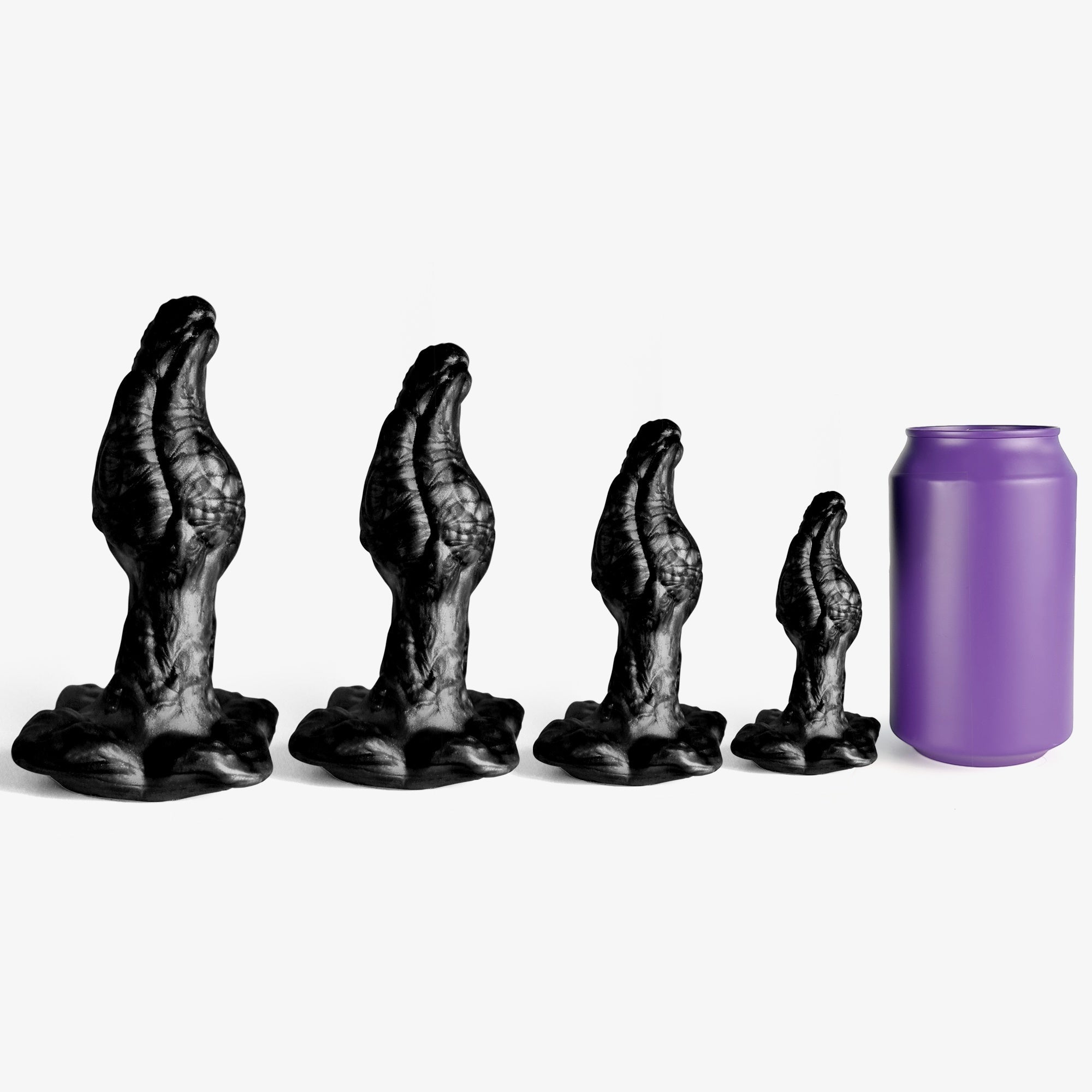 The aster plug butt plug size comparison next to 330ml can.