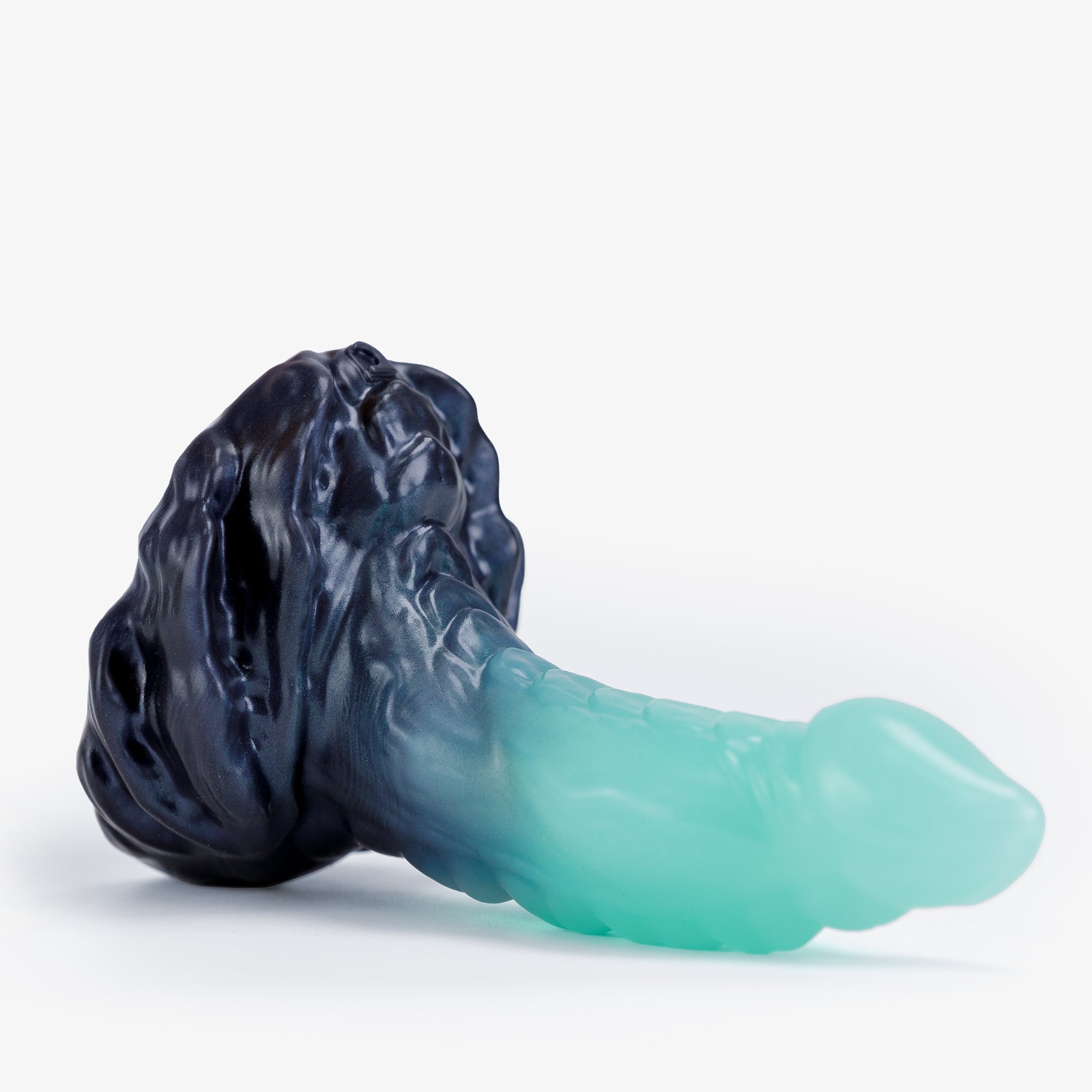 The dragon: knot iii dildo laying down.