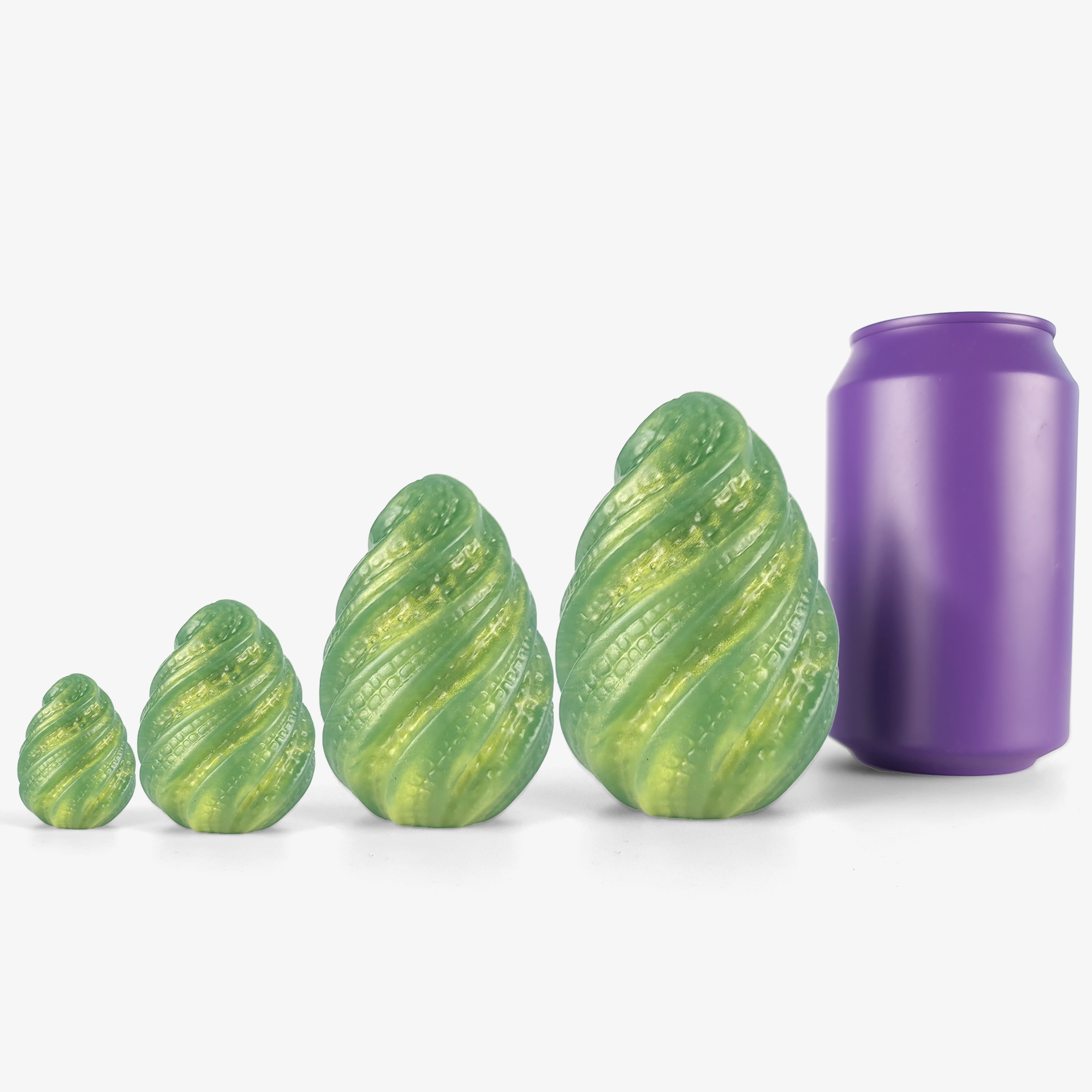 The alien egg (set of 3) ben wa balls & egg size comparison next to 330ml can.