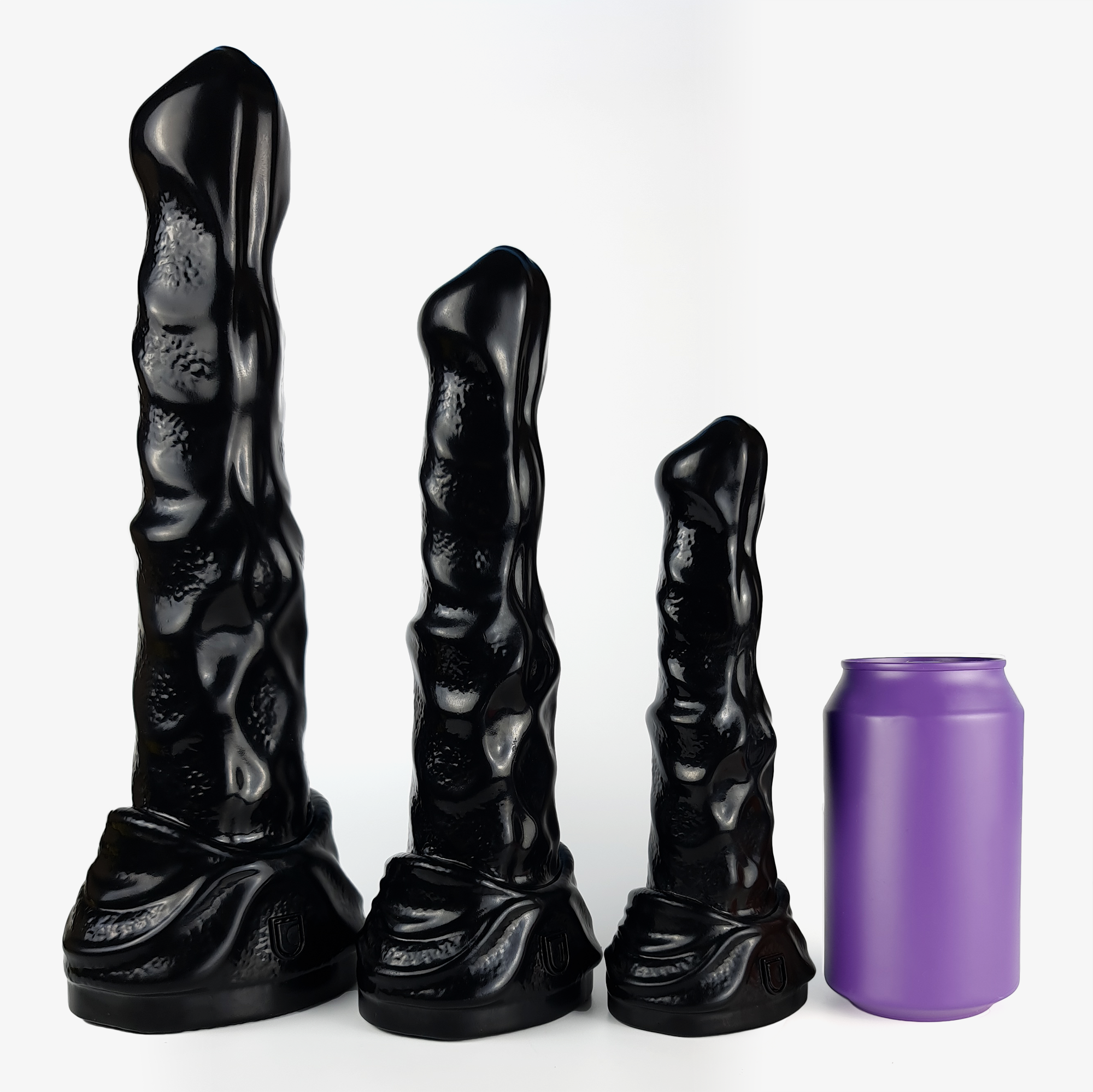 The sea horse dildo size comparison next to 330ml can.