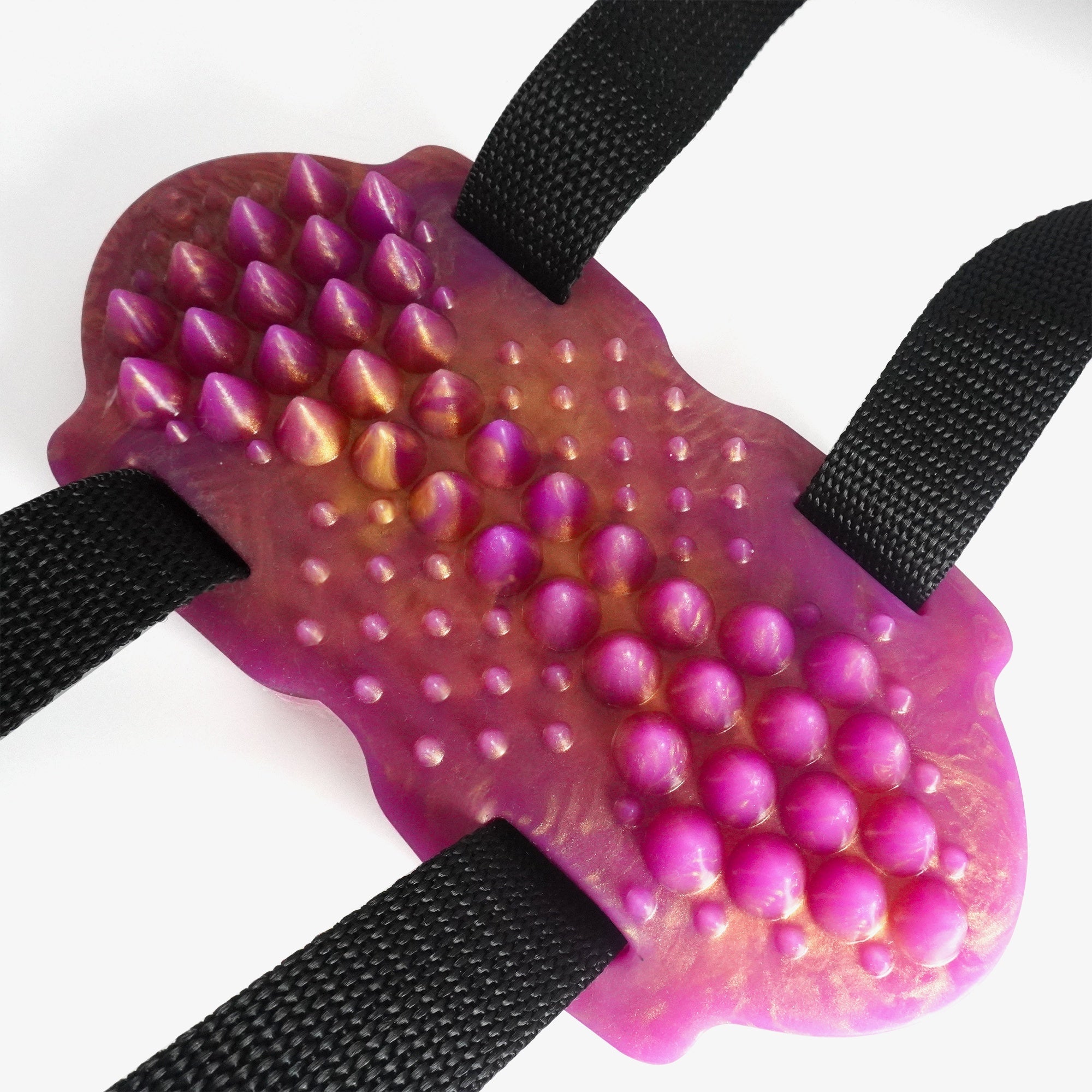 The spiked grinder with straps.