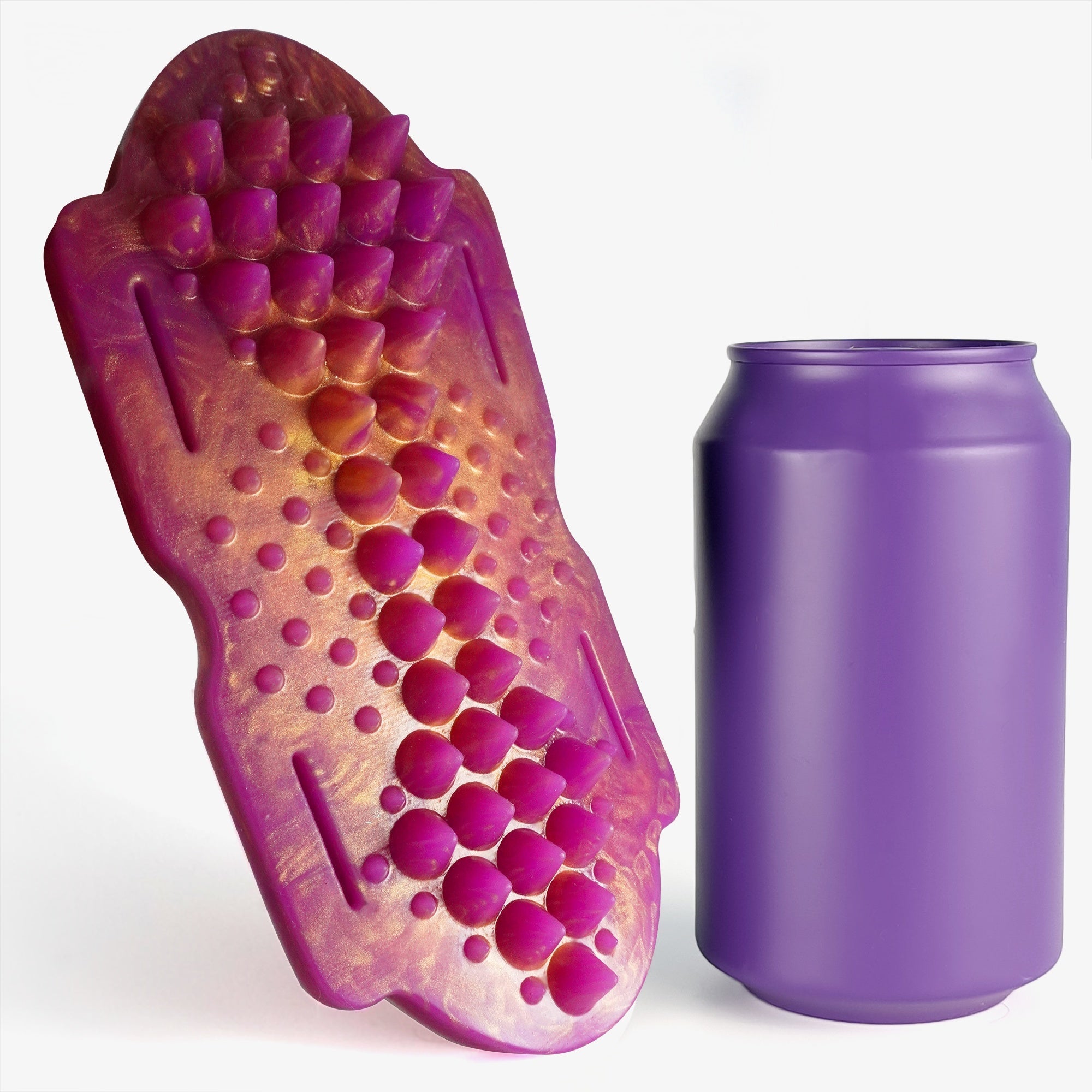 The spiked grinder size comparison next to 330ml can.