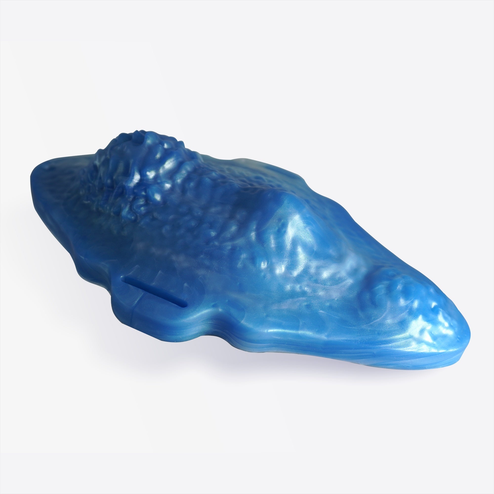 The swell grinder front laying down.