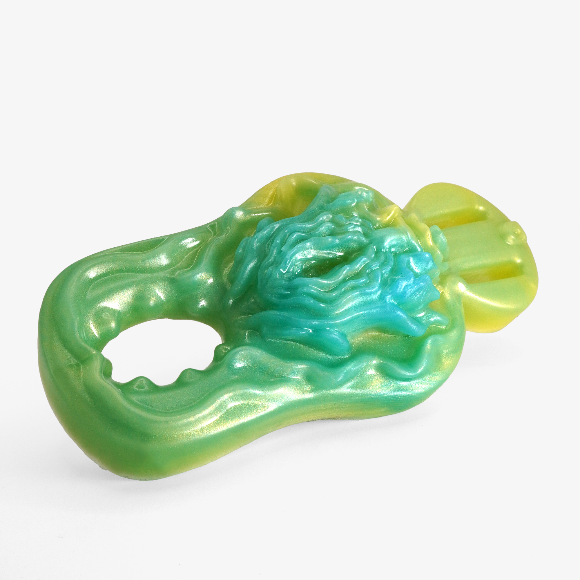 The synstyl grinder cock ring laying down.