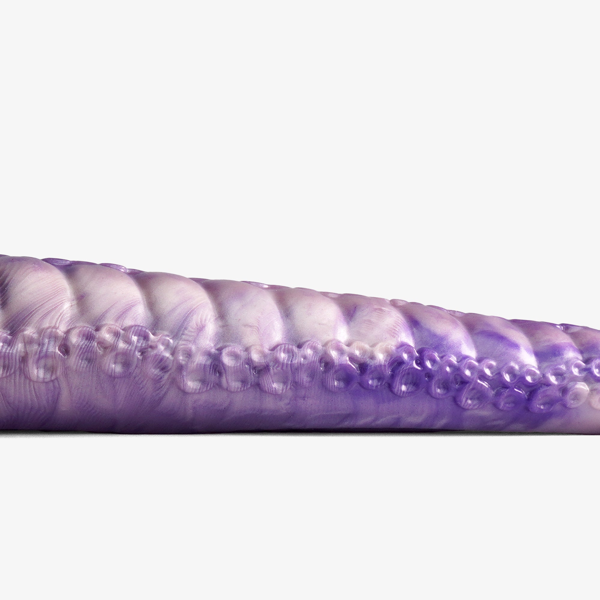 The tentacle depth trainer ii dildo laying down 2.