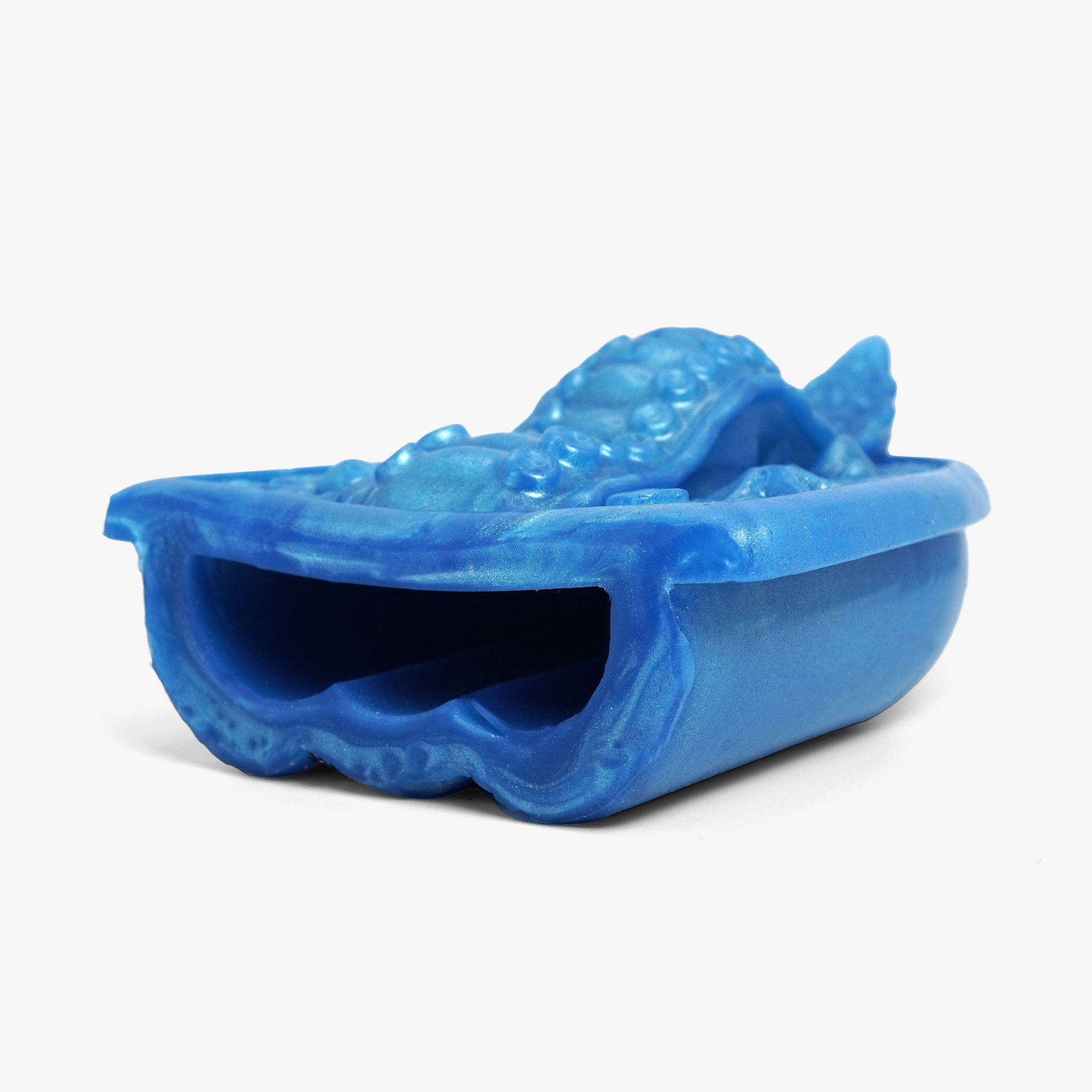 The handheld tentacle grinder ii laying down.